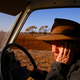 McKeown reacts as she drives her truck to feed her remaining cattle.